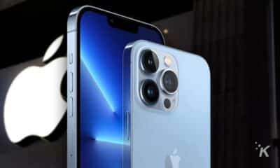 iphone 14 mockup with apple logo in background
