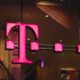 t-mobile logo on glass wall