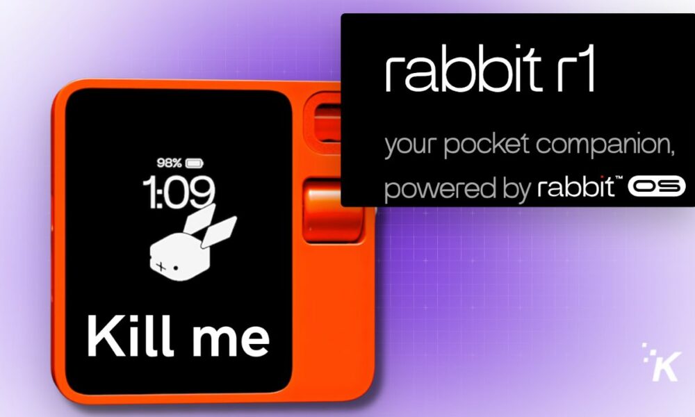 Orange device displaying rabbit with clock and battery status.