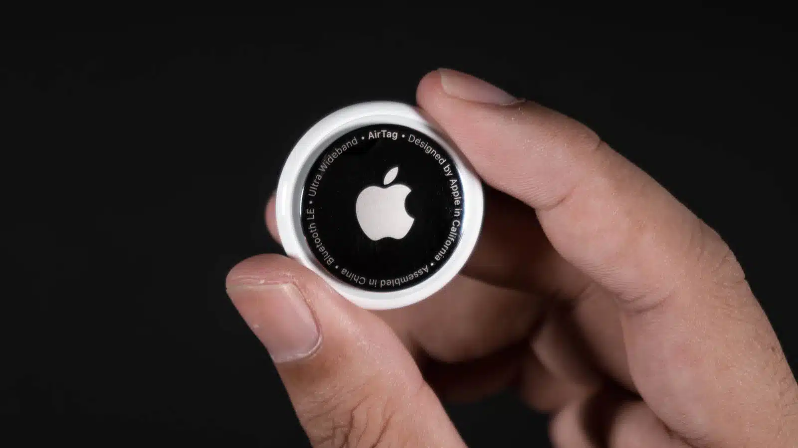 apple airtag being held