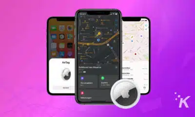 airtags and iphone on purple background