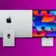 An Apple iMac with its back visible on the left and a colorful screen display of an Apple Pro Display XDR on the right against a purple background.