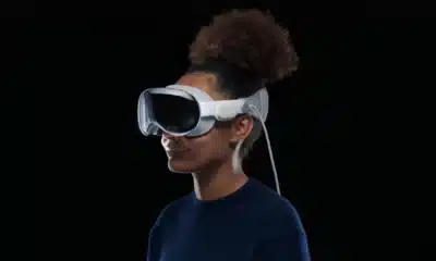 a black woman wearing an apple vision pro headset