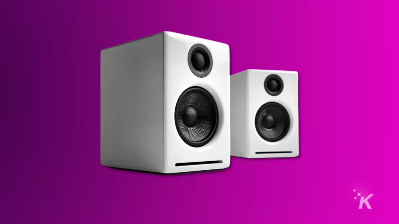 render of audioengine a2+ white speakers on a purple background