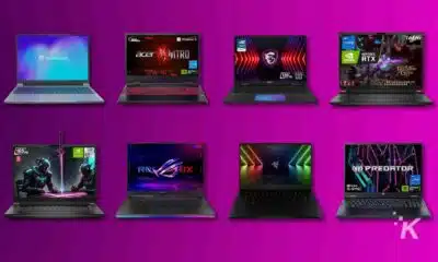 Eight gaming laptops on a purple background.
