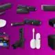 Various streaming devices and remotes on purple background.