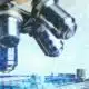 Microscope examining DNA strands, scientific research concept.