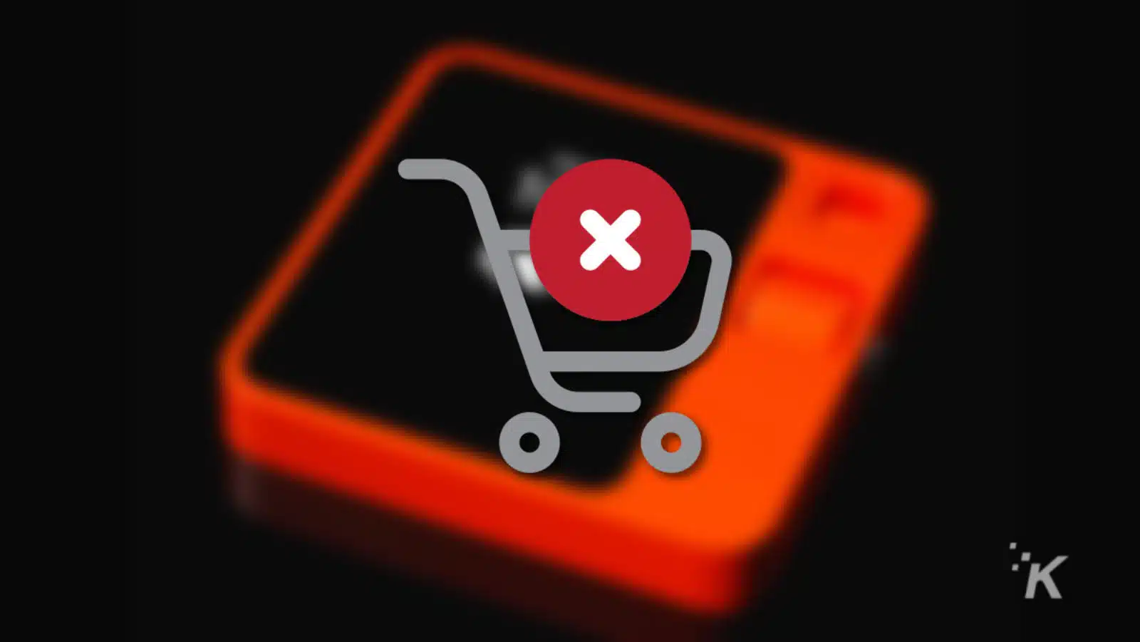 Red X over shopping cart on blurred rabbit r1 device in background