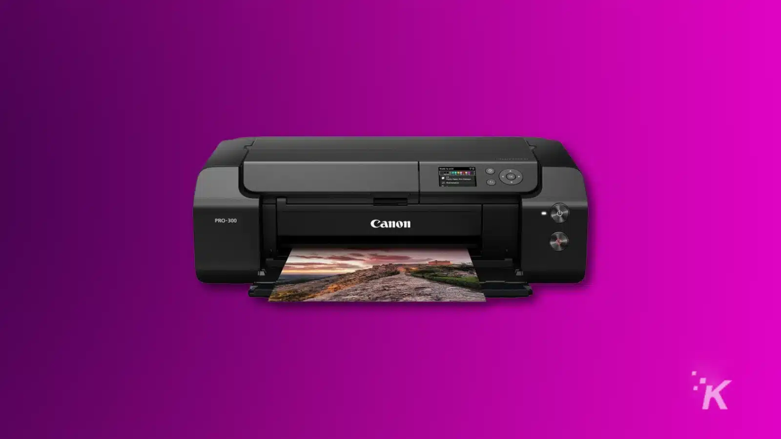Canon printer printing landscape photo on purple background.