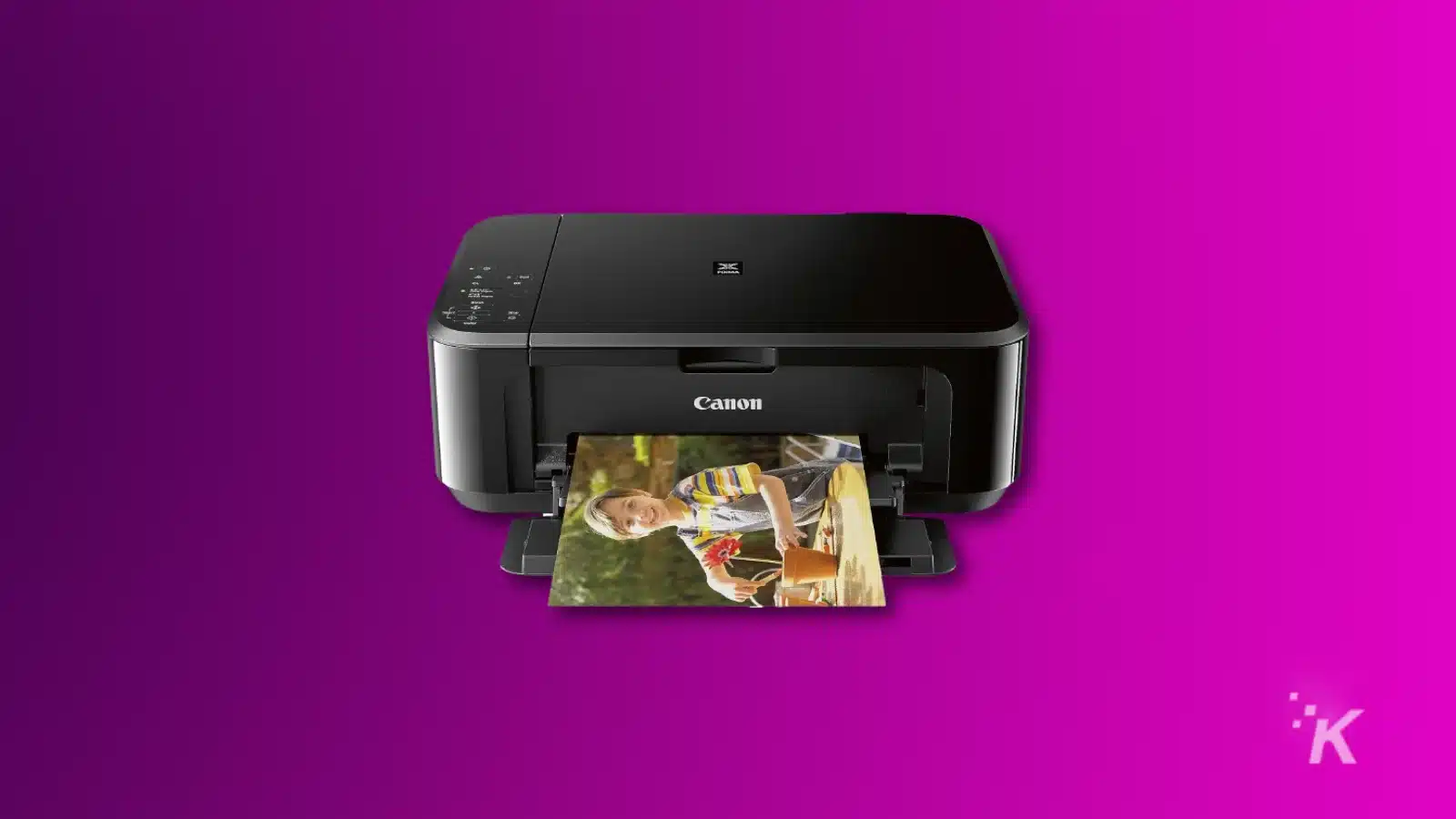 Canon printer producing vivid photo printout, on a purple background