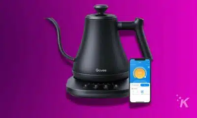Govee smart kettle and mobile app on purple background.