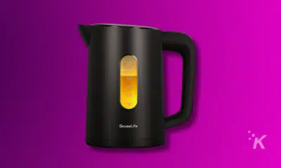 Black electric kettle with visible water level indicator.