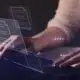 person on computer collecting data.