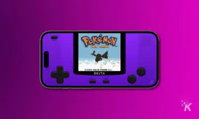 delta emulator displaying classic Pokémon game, on a purple background