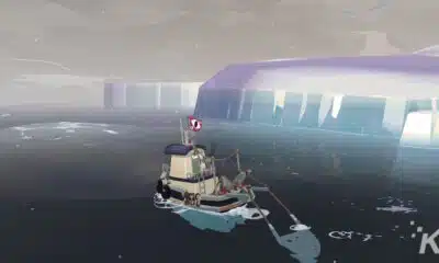 Fishing boat on calm sea near futuristic structure.