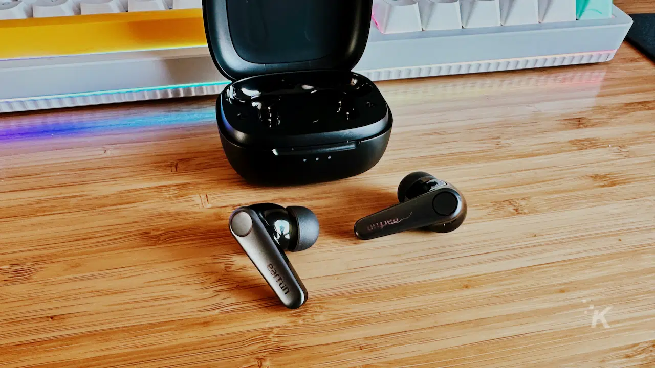 earfun headphones on office desk