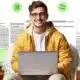Young man in front of a computer using EssayFlow