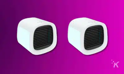 Two portable air conditioners on purple background. Evachill EV-500