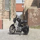 fuell fllow electric motorbike in an industrial neighborhood