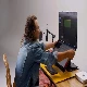geminos dual monitor being adjusted by a man