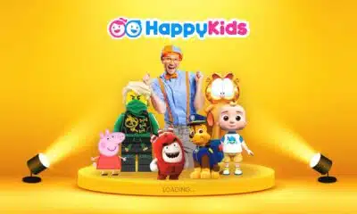A cartoon toy is being animated and loaded indoors.