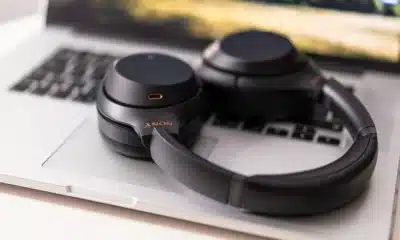 ANC headphones on top of a laptop keyboard