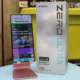 Infinix Zerd Ultra phone on stand next to it's box