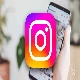 instagram logo with blurred phone background