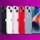 Colorful smartphones displayed on purple background.