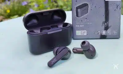 jvc in-ear buds on teal table