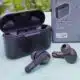 jvc in-ear buds on teal table