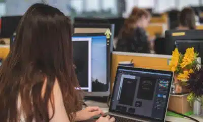 Person on the computer creating a logo.