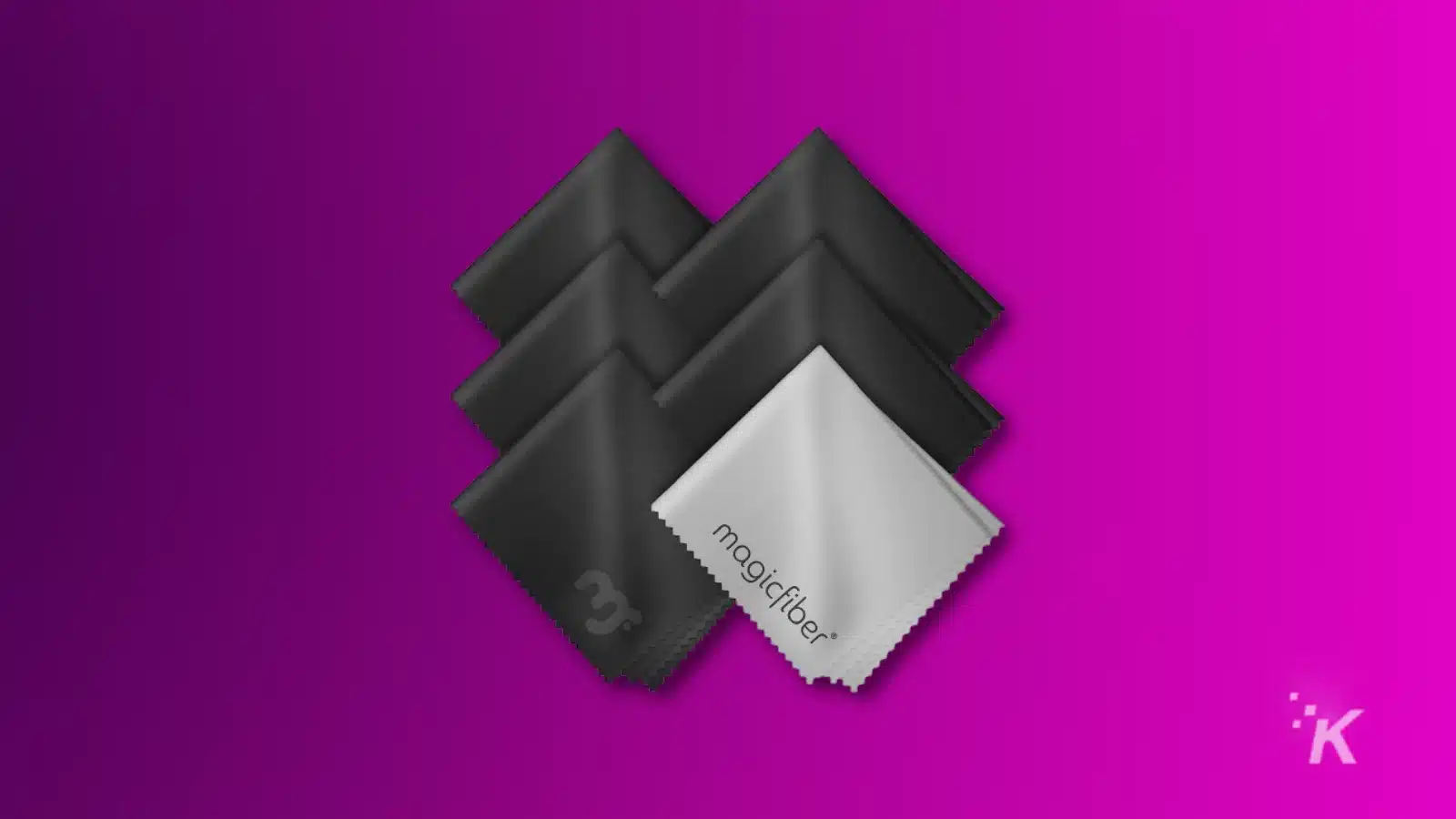 microfiber cleaning cloths on a purple background