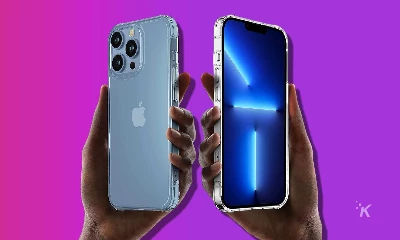 hands holding mkeke iphone 13 pro max cases on purple background