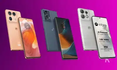 Five Motorola smartphones on purple background.