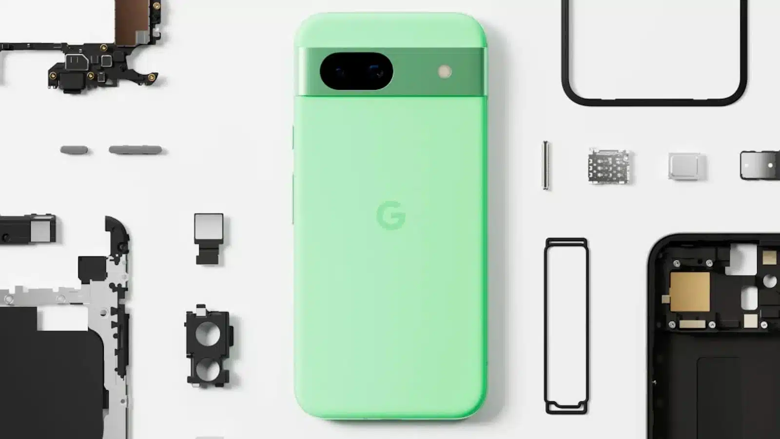 Disassembled green smartphone with internal components displayed.