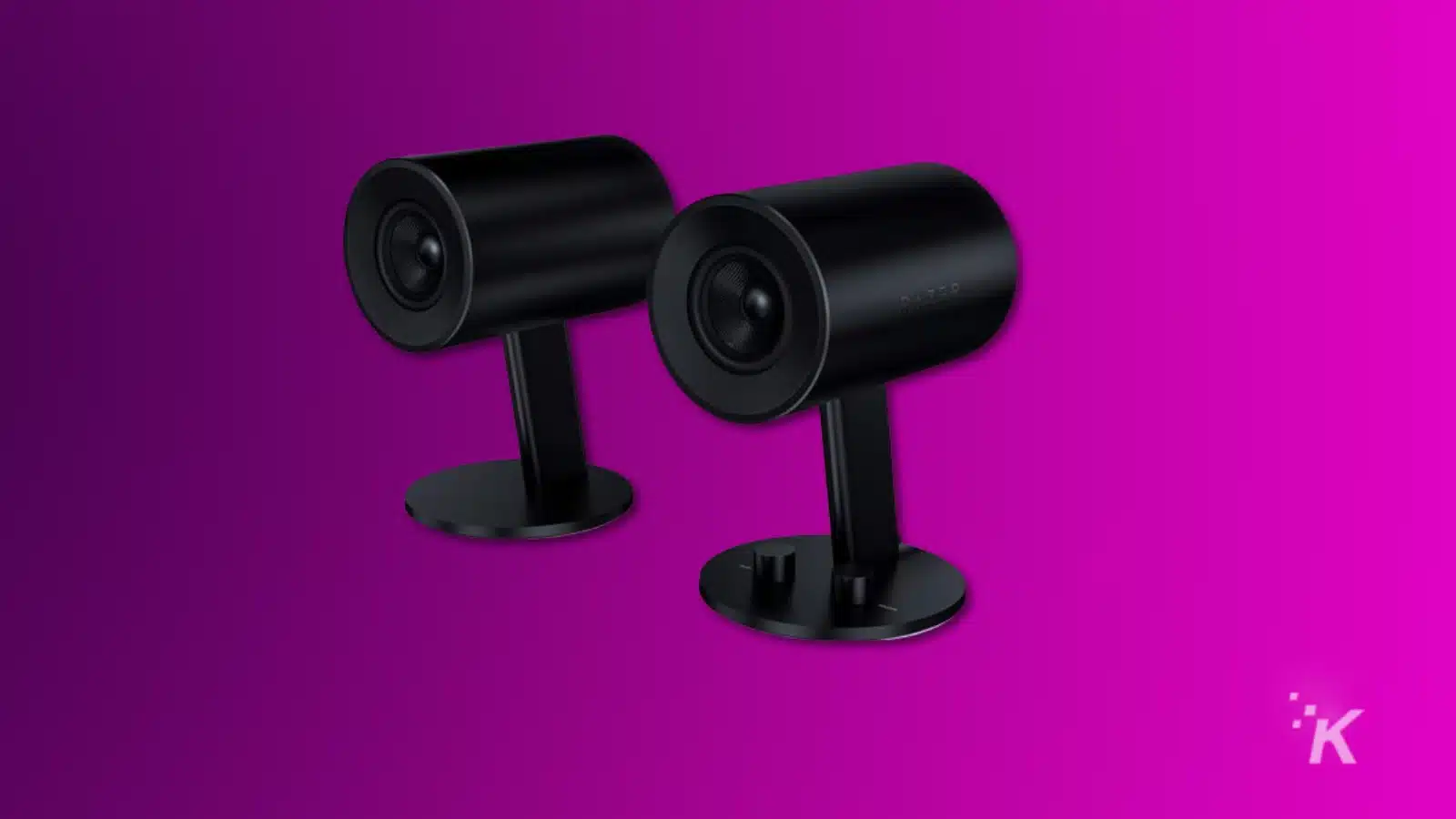render of razer nommo chroma speakers on a purple background
