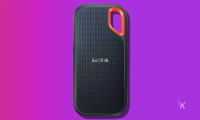 sandisk portable ssd drive on a purple background