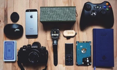 gadgets on wooden table