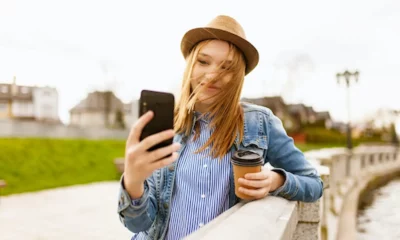 Girl taking a selfie with her phone