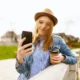 Girl taking a selfie with her phone