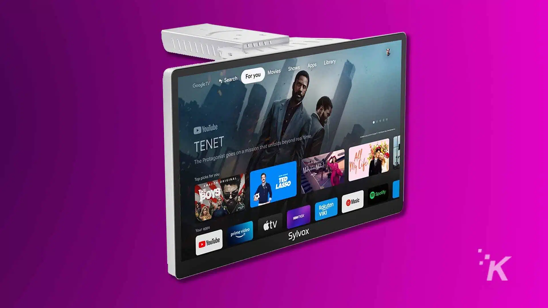Smart TV displaying Google TV interface on purple background.