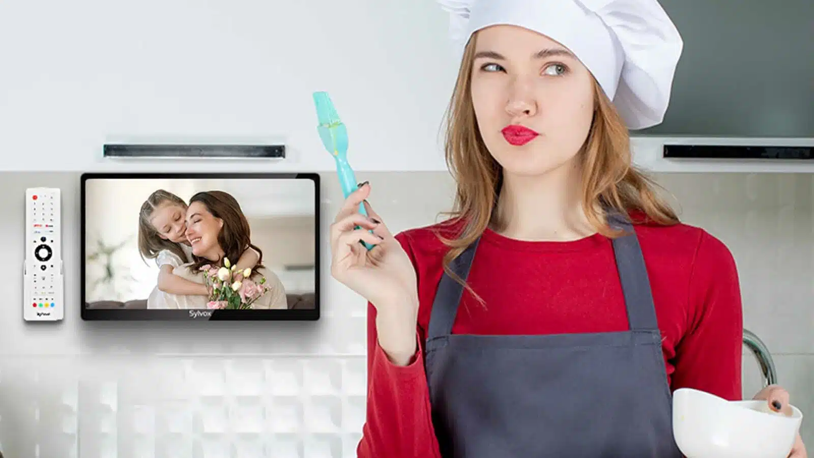 Woman in chef hat with spatula near TV showing family. Sylvox 