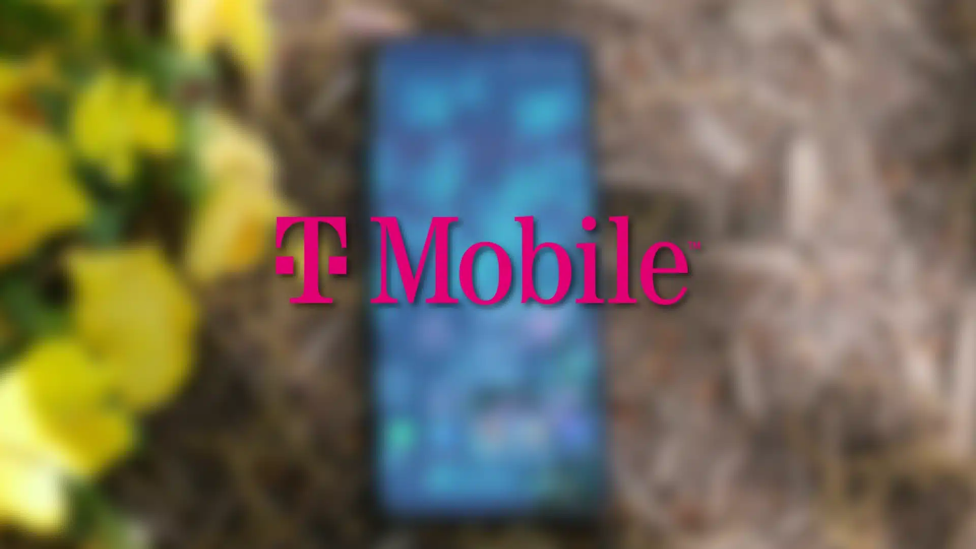 t-mobile logo floating over a blurred smartphone on the ground