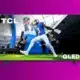 An image displays a large TCL QLED television showcasing an American football player in a blue jersey diving towards a goal line during an NFL game.