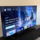 tcl q7 65-inch qled tv on a cabinet