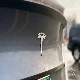 tesla badge on rear of model 3