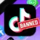 TikTok app icon with 'BANNED' stamp on smartphone screen.