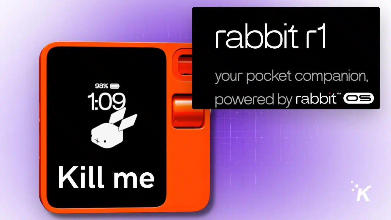 Orange device displaying rabbit with clock and battery status.