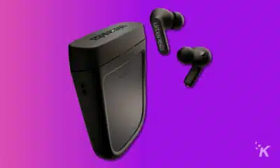 urbanista pheonix solar charging earbuds on purple background